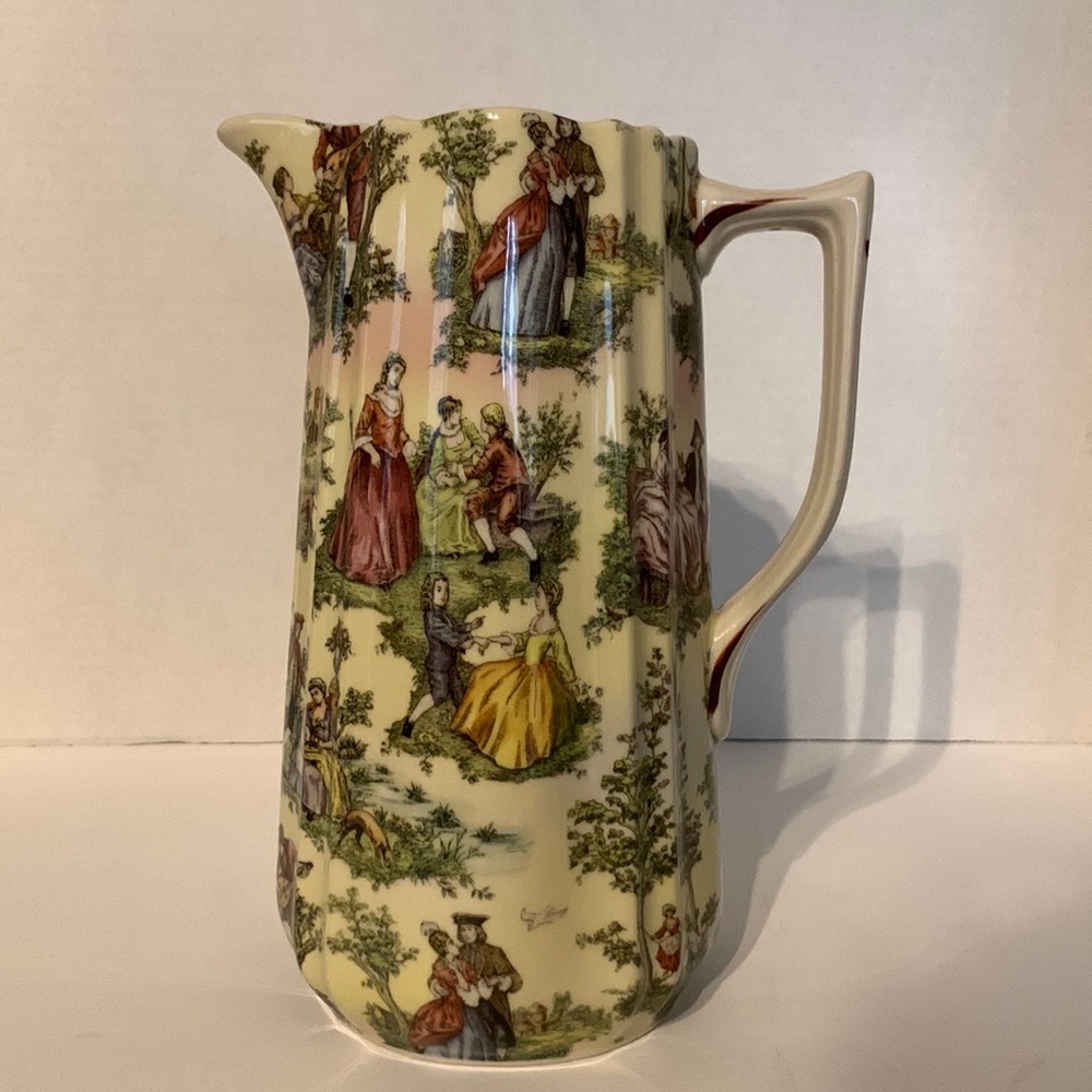 Gorgeous pitcher,Beautiful colonial pattern,of ladies and gent’s  in a garden.